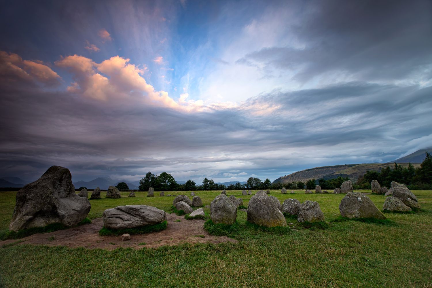 Approaching sunset at Castlerigg Stone Circle by Martin Lawrence Photography