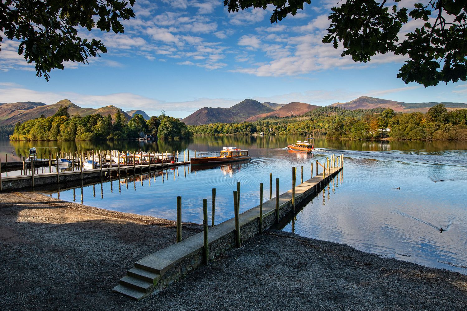 Summer sailings across Derwentwater by Martin Lawrence Photography