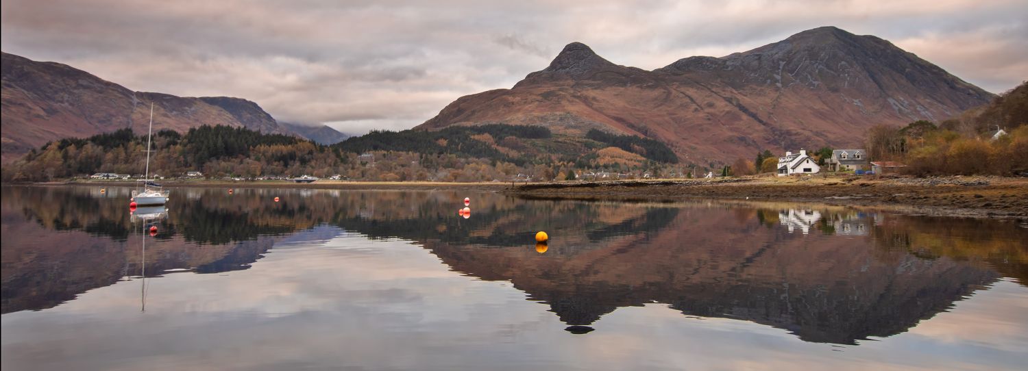 The Pap of Glencoe reflected in Loch Leven by Martin Lawrence Photography