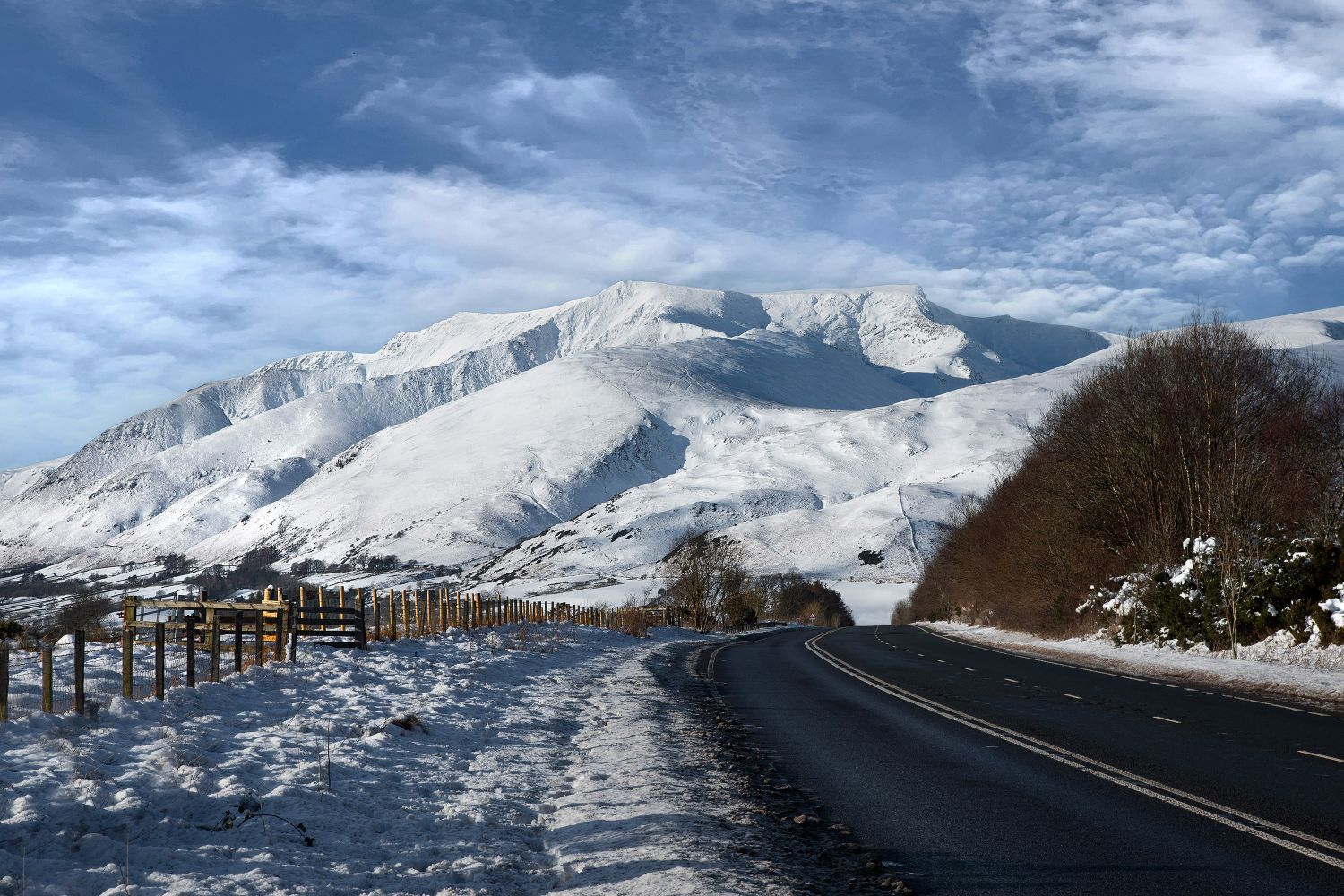 Snow covers The Blencathra Ridges by Martin Lawrence Photography